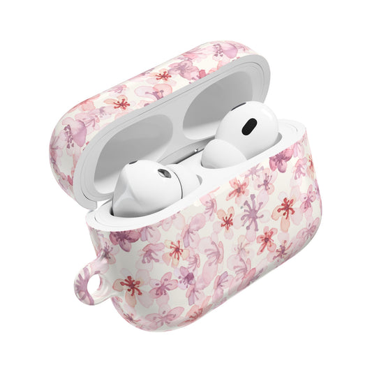 Květinový obal na AirPods s růžovým květinovým motivem, stylový doplněk pro milovníky hudby.